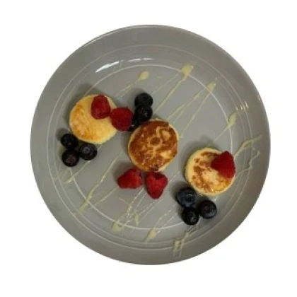 anastasiya-domashnie-sirniki-na-risovoy-muke-photo