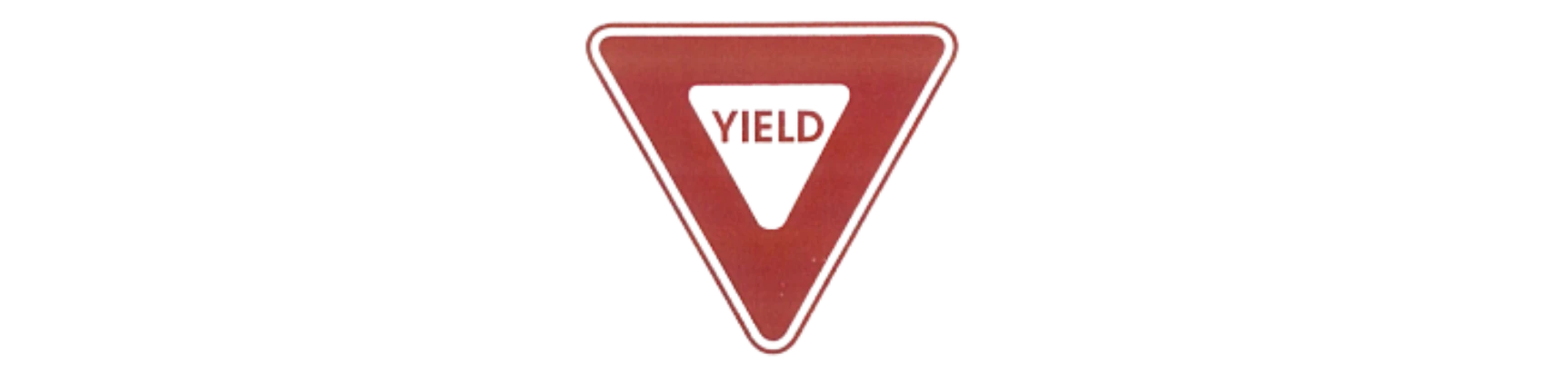 Знак YIELD — перевернутый треугольник